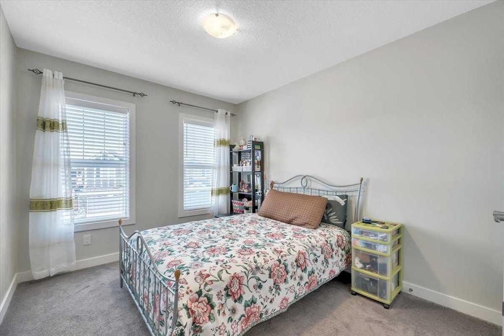 81 Legacy Woods Place Se, Calgary, AB - Indoor Photo Showing Bedroom