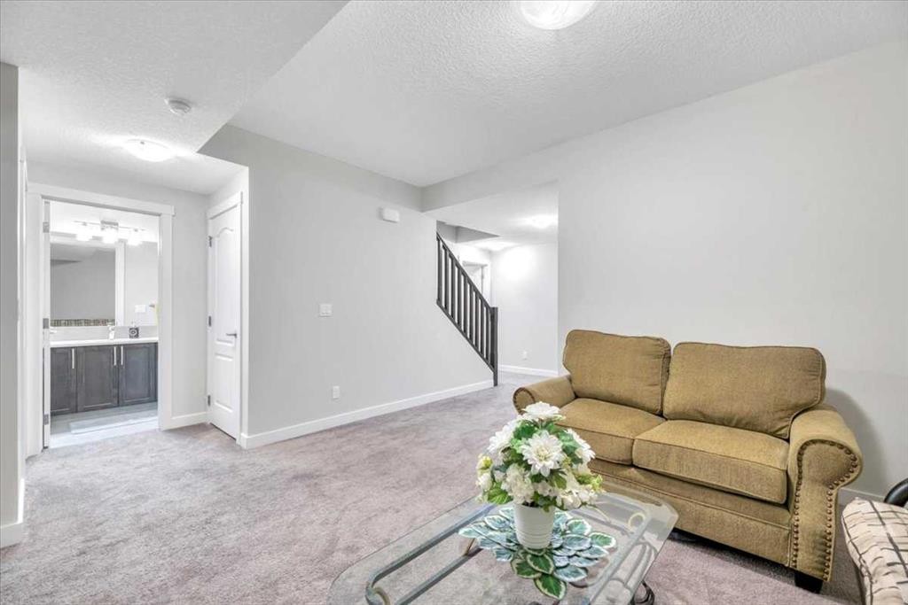 81 Legacy Woods Place Se, Calgary, AB - Indoor Photo Showing Living Room