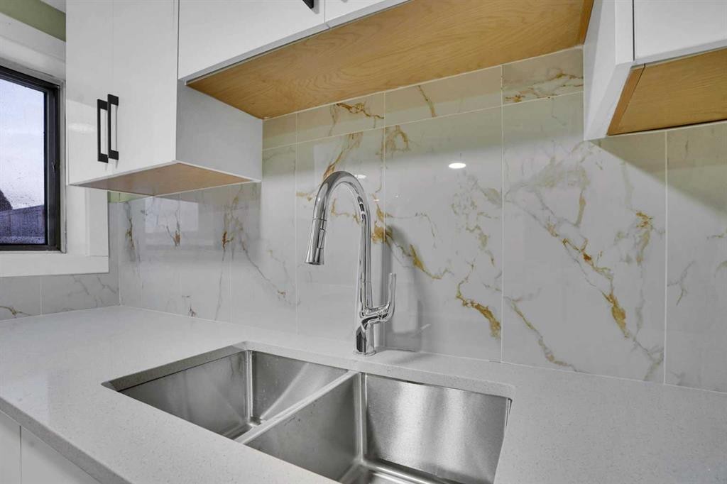 3908 49 Street Ne, Calgary, AB - Indoor Photo Showing Kitchen With Double Sink