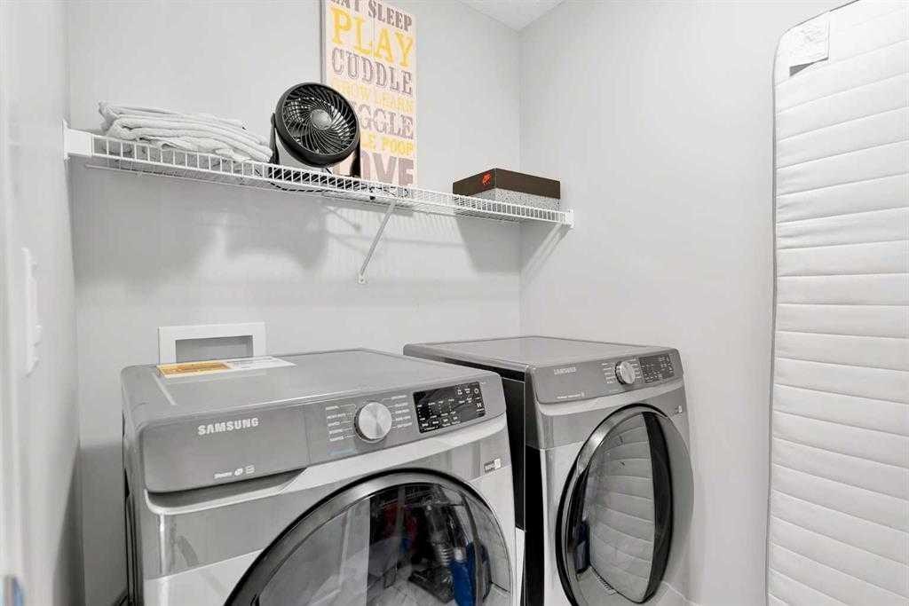 103 Dawson Harbour Hill, Chestermere, AB - Indoor Photo Showing Laundry Room