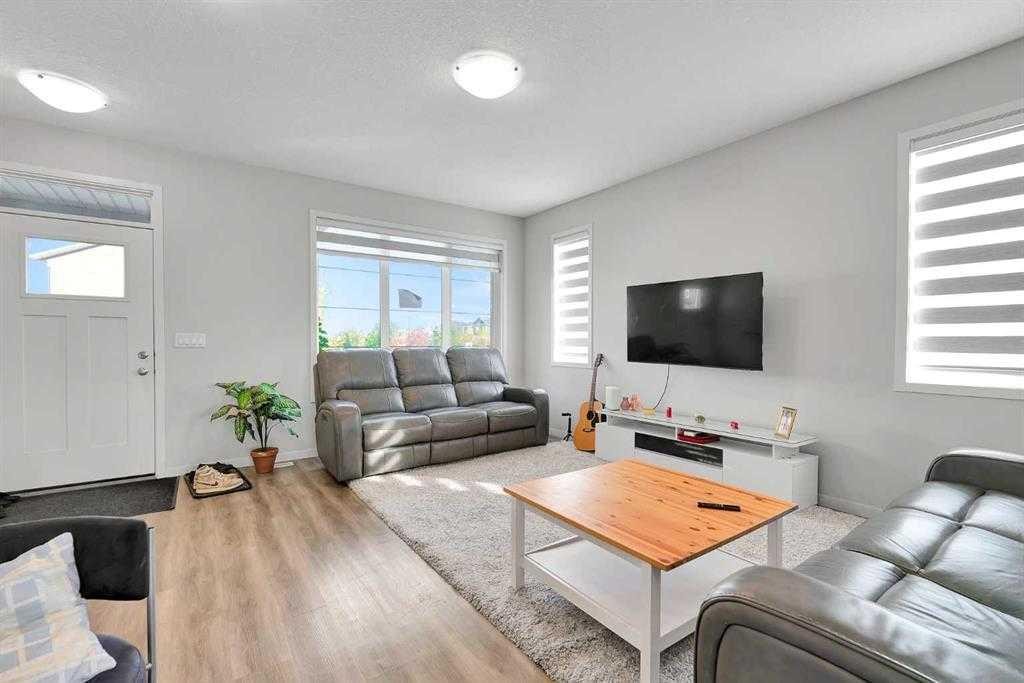 103 Dawson Harbour Hill, Chestermere, AB - Indoor Photo Showing Living Room