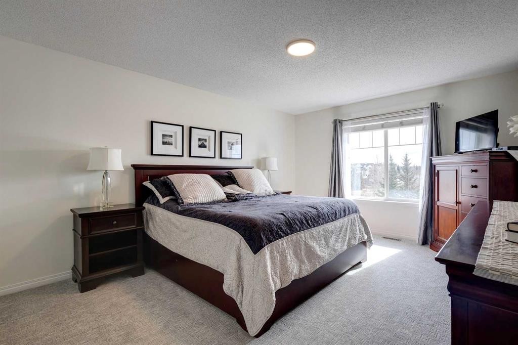 15 Copperfield Close Se, Calgary, AB - Indoor Photo Showing Bedroom