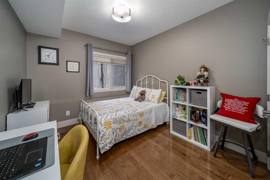 116-77 George Fox Trail, Cochrane, AB - Indoor Photo Showing Bedroom