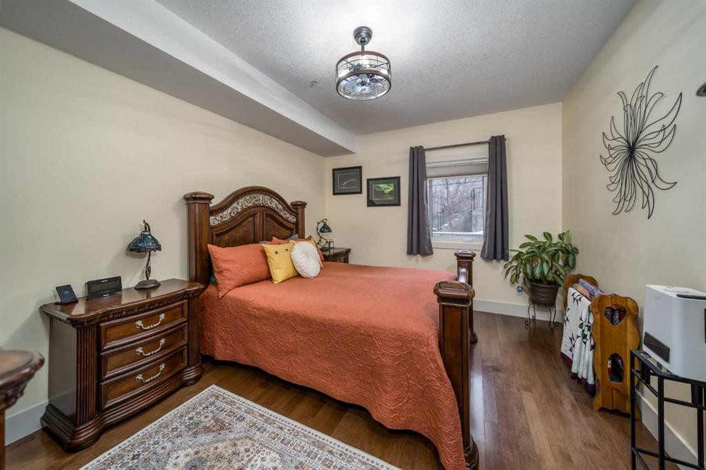 116-77 George Fox Trail, Cochrane, AB - Indoor Photo Showing Bedroom
