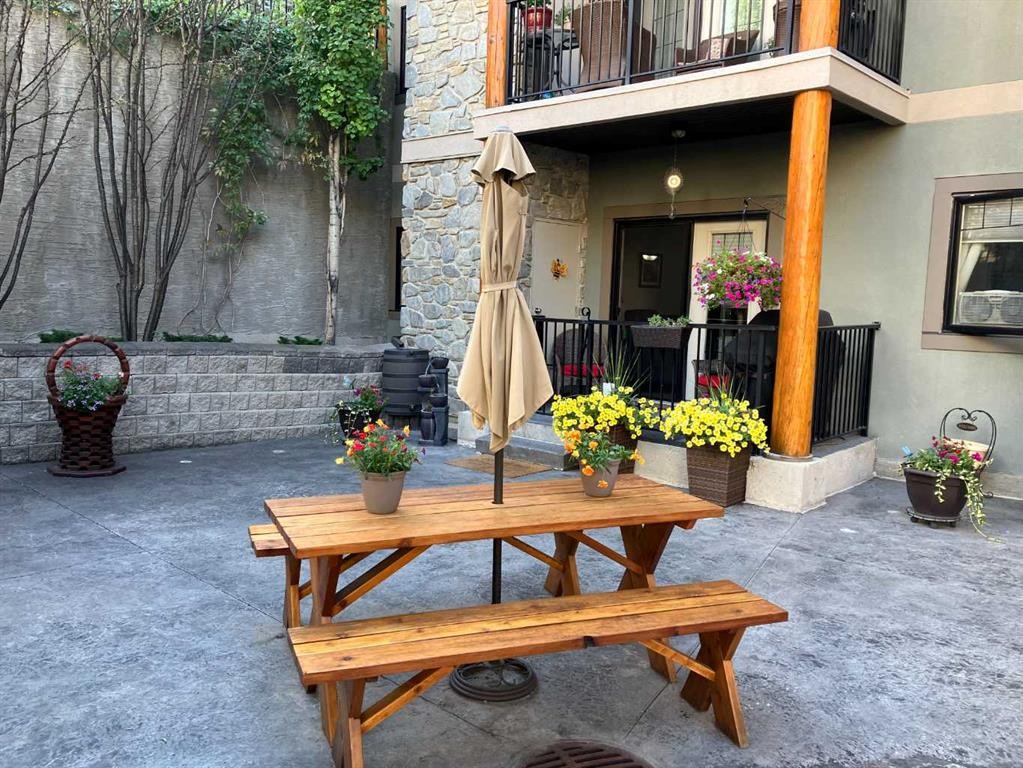 116-77 George Fox Trail, Cochrane, AB - Outdoor With Deck Patio Veranda