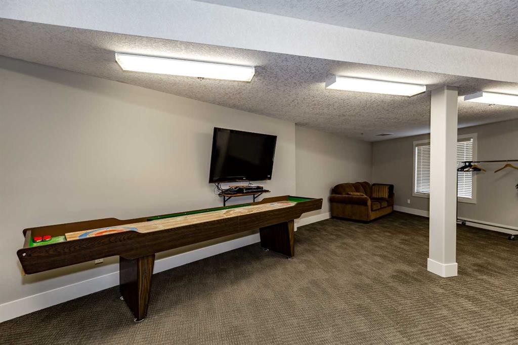 116-77 George Fox Trail, Cochrane, AB - Indoor Photo Showing Other Room