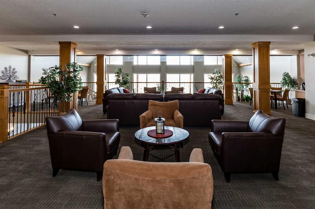 116-77 George Fox Trail, Cochrane, AB - Indoor Photo Showing Living Room