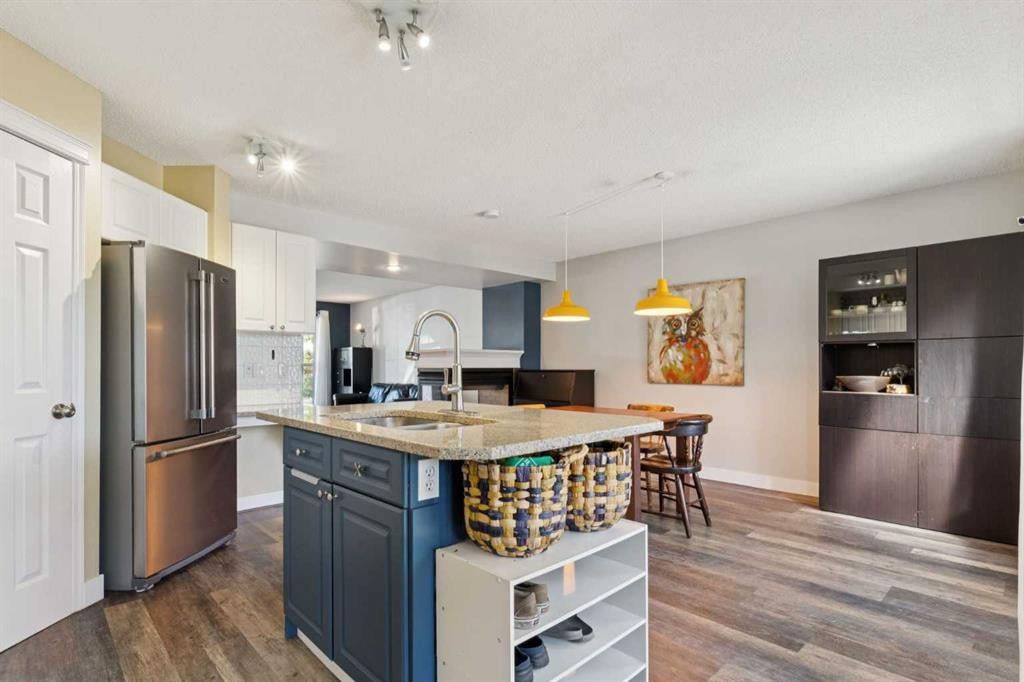 117 Tuscany Drive Nw, Calgary, AB - Indoor Photo Showing Kitchen With Stainless Steel Kitchen With Double Sink