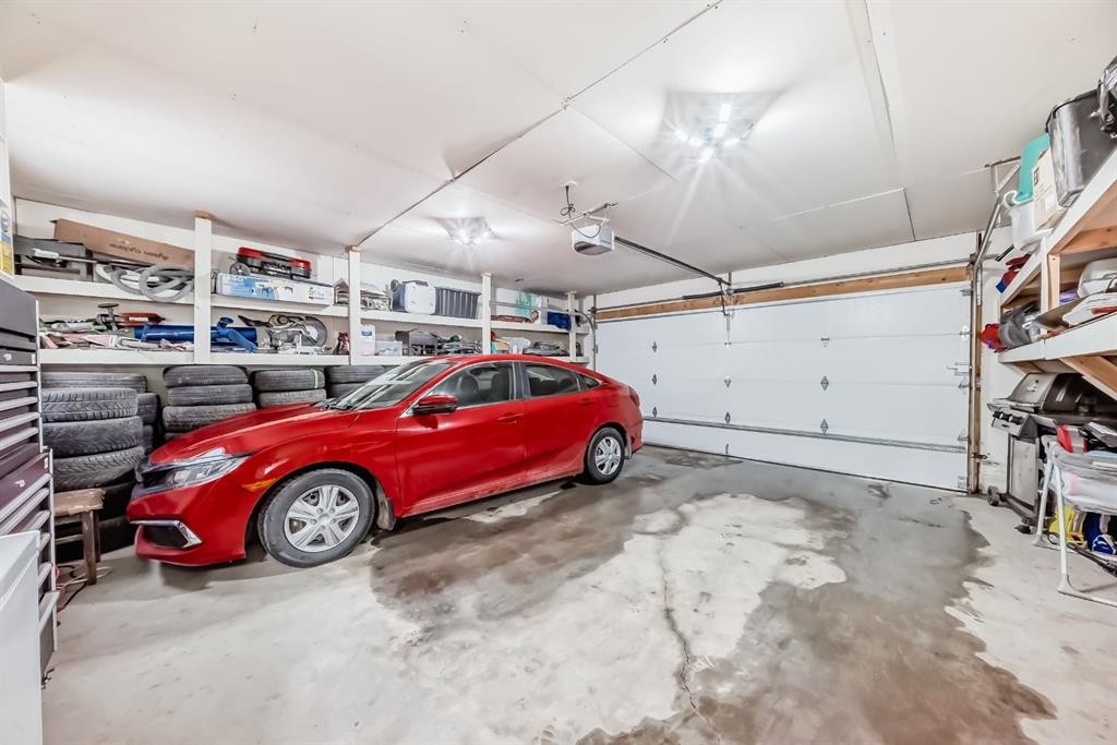 36 Red Embers Row Ne, Calgary, AB - Indoor Photo Showing Garage