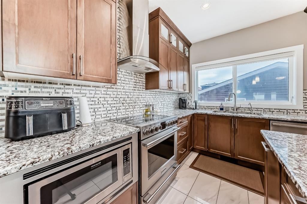 36 Red Embers Row Ne, Calgary, AB - Indoor Photo Showing Kitchen With Stainless Steel Kitchen With Upgraded Kitchen