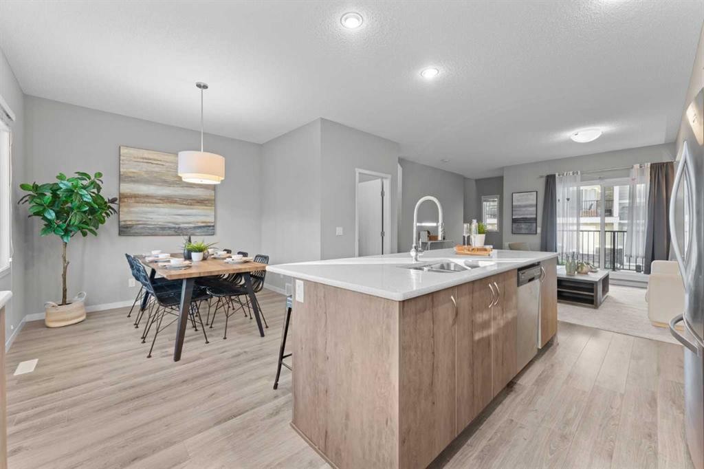 108 Nolanlake Villas Nw, Calgary, AB - Indoor Photo Showing Kitchen With Double Sink
