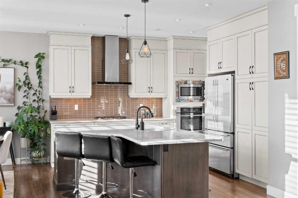 108 Windgate Close Sw, Airdrie, AB - Indoor Photo Showing Kitchen With Stainless Steel Kitchen With Upgraded Kitchen