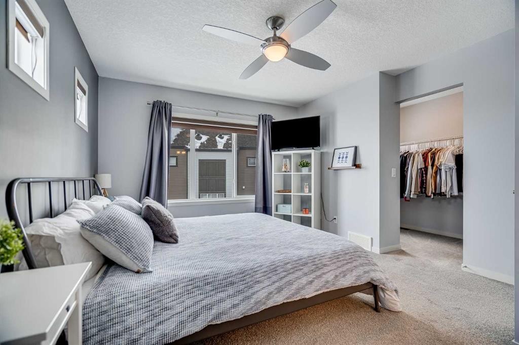 335 Copperpond Row Se, Calgary, AB - Indoor Photo Showing Bedroom