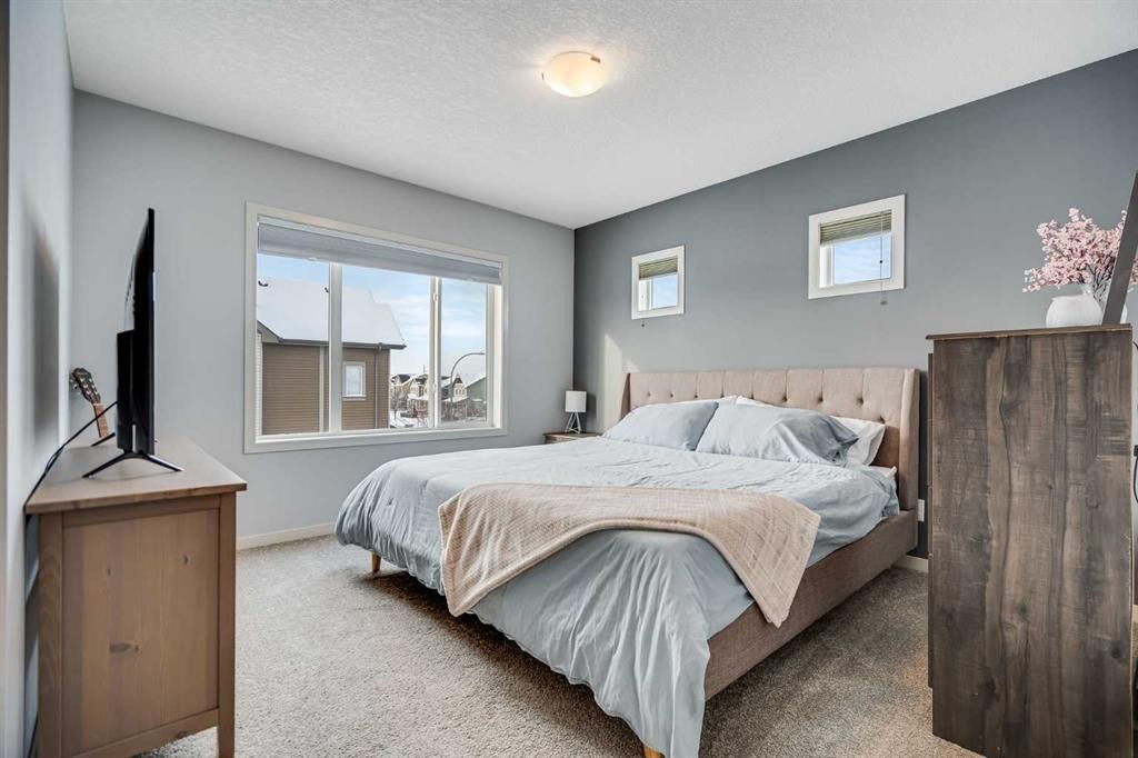 335 Copperpond Row Se, Calgary, AB - Indoor Photo Showing Bedroom