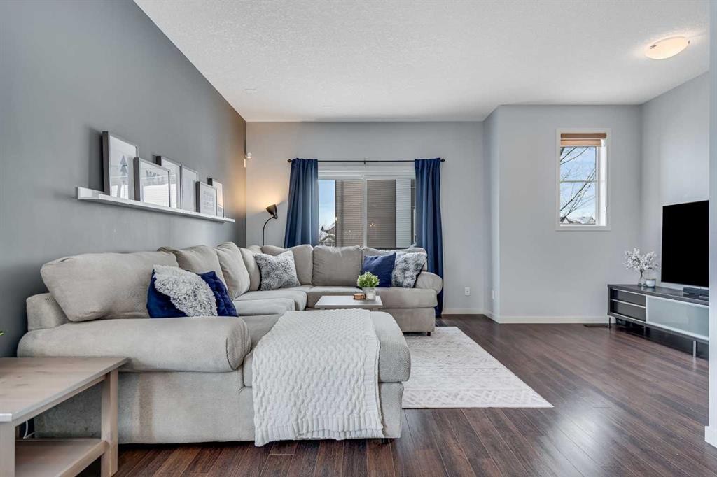 335 Copperpond Row Se, Calgary, AB - Indoor Photo Showing Living Room