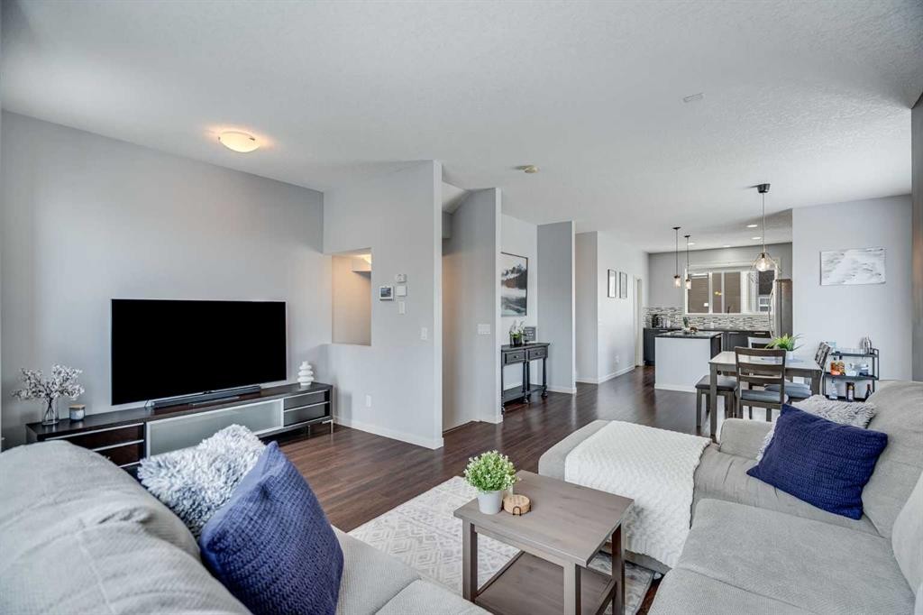 335 Copperpond Row Se, Calgary, AB - Indoor Photo Showing Living Room