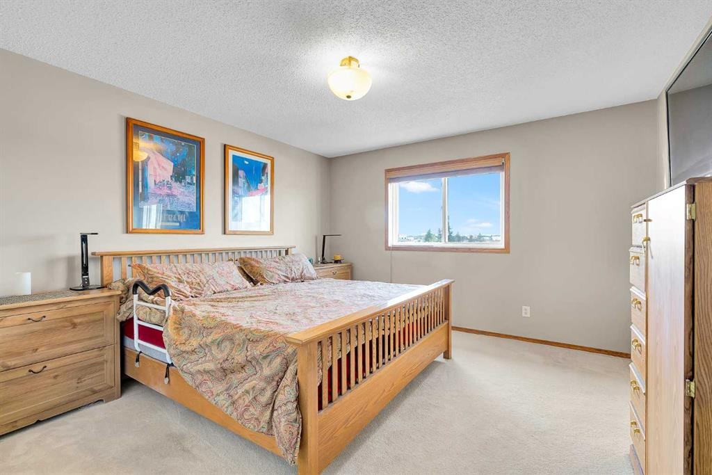 132 Saddletree Close Ne, Calgary, AB - Indoor Photo Showing Bedroom