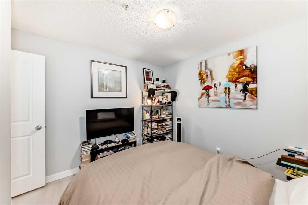 314-5 Saddlestone Way, Calgary, AB - Indoor Photo Showing Bedroom