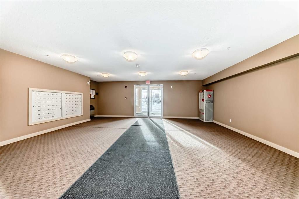 314-5 Saddlestone Way, Calgary, AB - Indoor Photo Showing Other Room