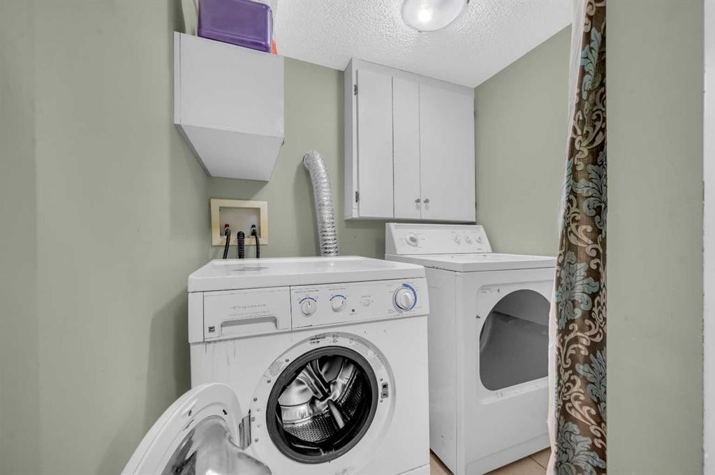 212 Tarawood Place Ne, Calgary, AB - Indoor Photo Showing Laundry Room