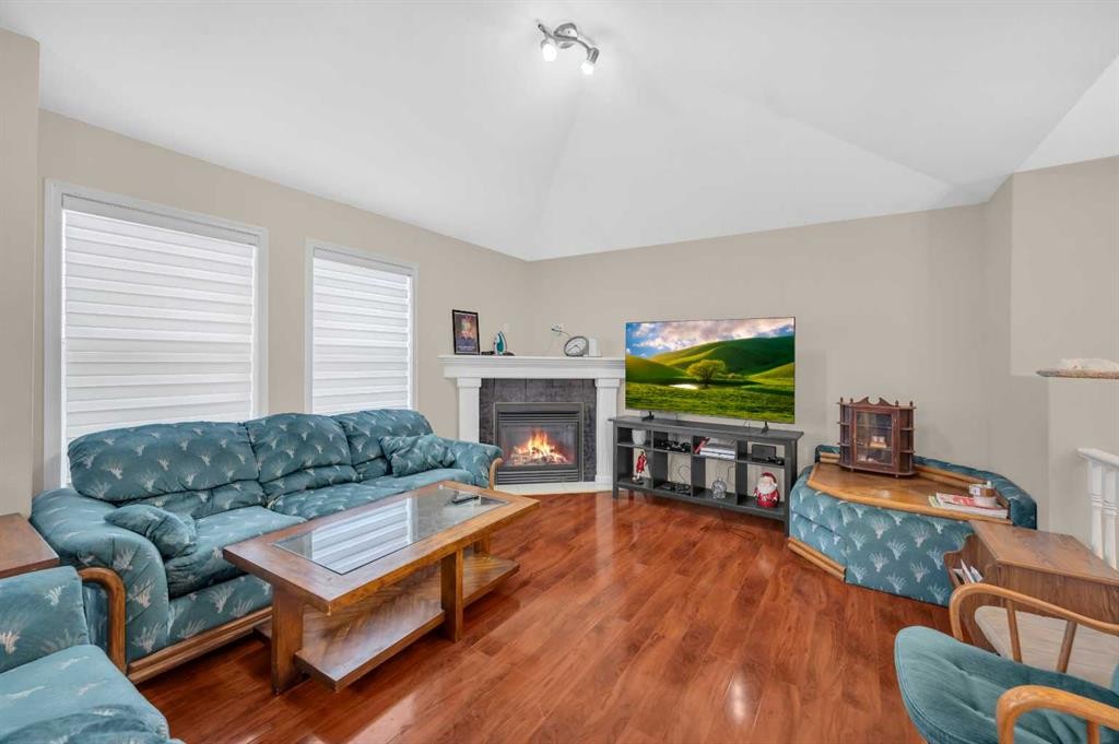 212 Tarawood Place Ne, Calgary, AB - Indoor Photo Showing Living Room With Fireplace