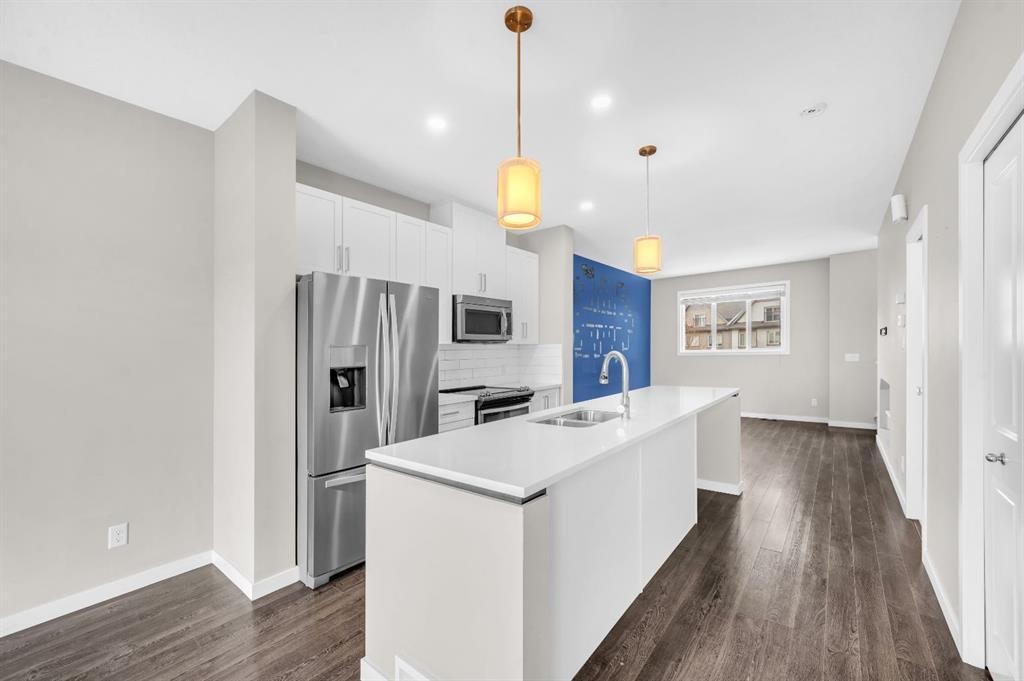 50 Copperstone Common Se, Calgary, AB - Indoor Photo Showing Kitchen With Double Sink With Upgraded Kitchen