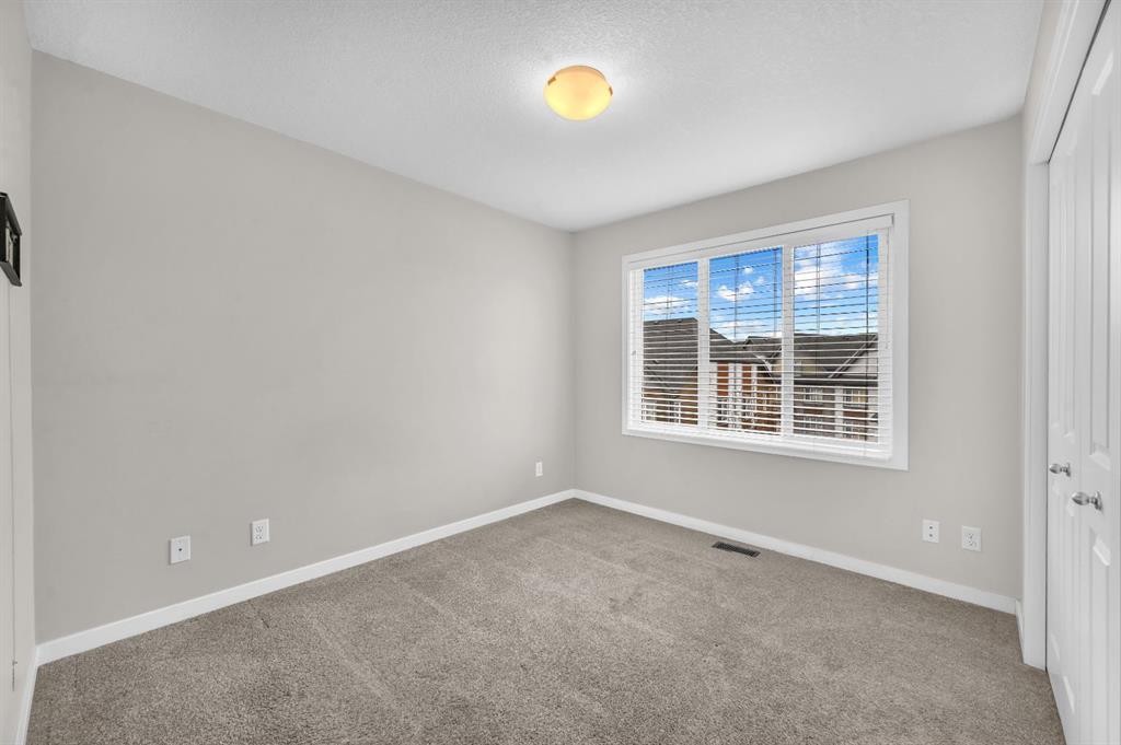 50 Copperstone Common Se, Calgary, AB - Indoor Photo Showing Other Room