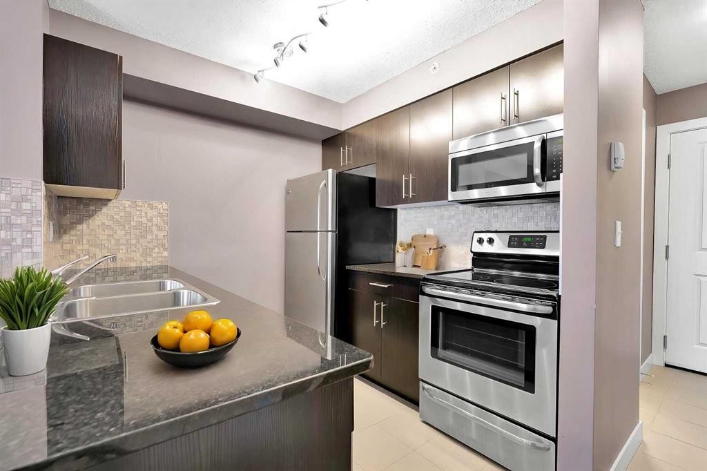 3407-81 Legacy Boulevard Se, Calgary, AB - Indoor Photo Showing Kitchen With Double Sink With Upgraded Kitchen