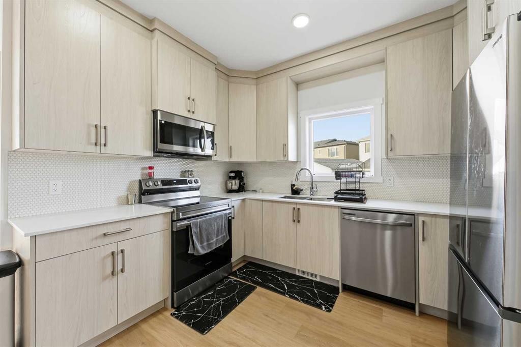 21 Cornerbrook Lane Ne, Calgary, AB - Indoor Photo Showing Kitchen With Stainless Steel Kitchen