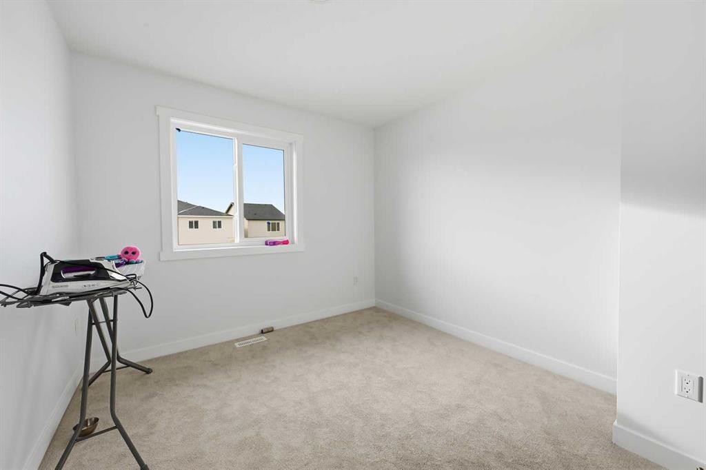21 Cornerbrook Lane Ne, Calgary, AB - Indoor Photo Showing Bedroom
