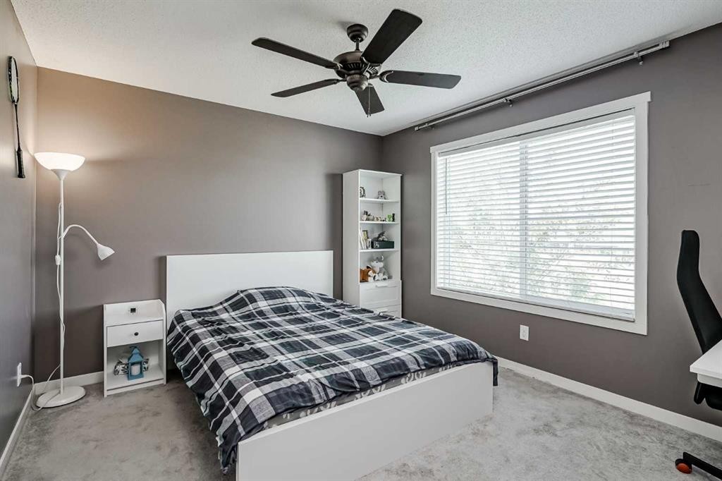 313 Copperpond Landing Se, Calgary, AB - Indoor Photo Showing Bedroom