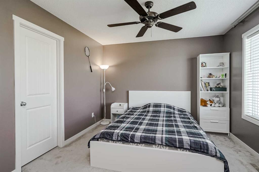 313 Copperpond Landing Se, Calgary, AB - Indoor Photo Showing Bedroom