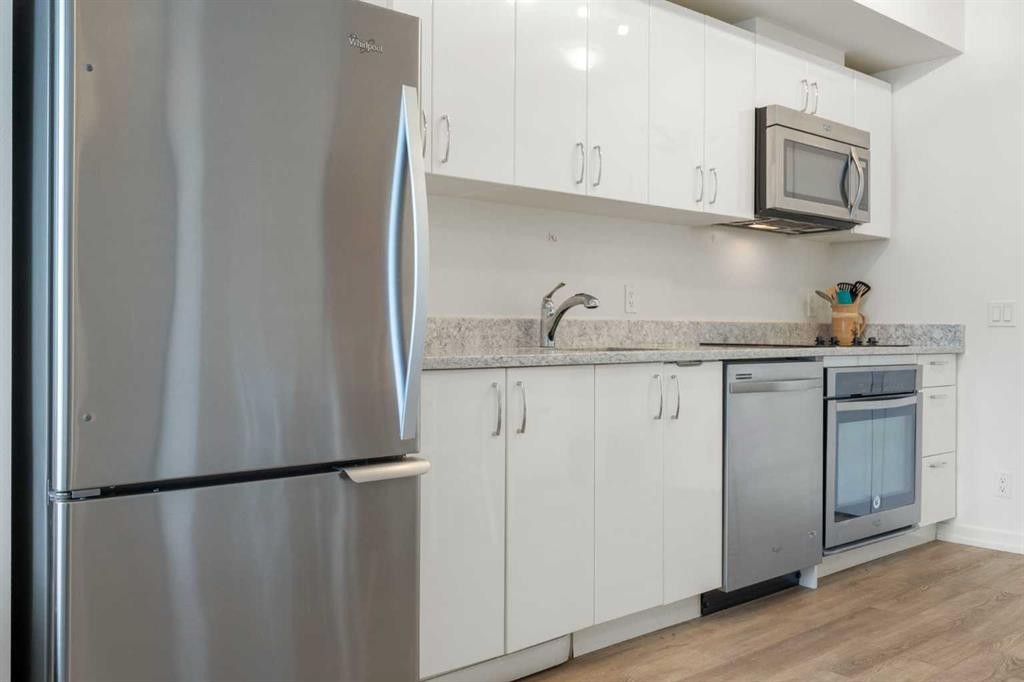 1503-450 8 Avenue Se, Calgary, AB - Indoor Photo Showing Kitchen With Stainless Steel Kitchen With Upgraded Kitchen