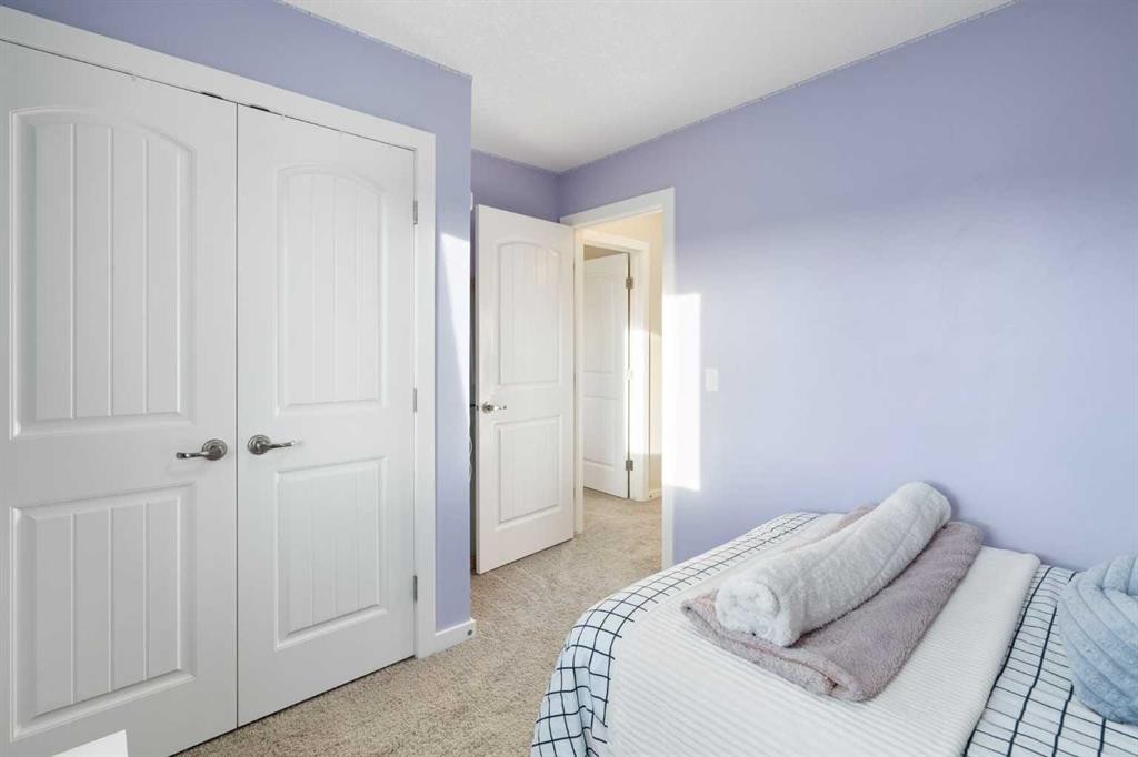 13 Marquis Place Se, Calgary, AB - Indoor Photo Showing Bedroom