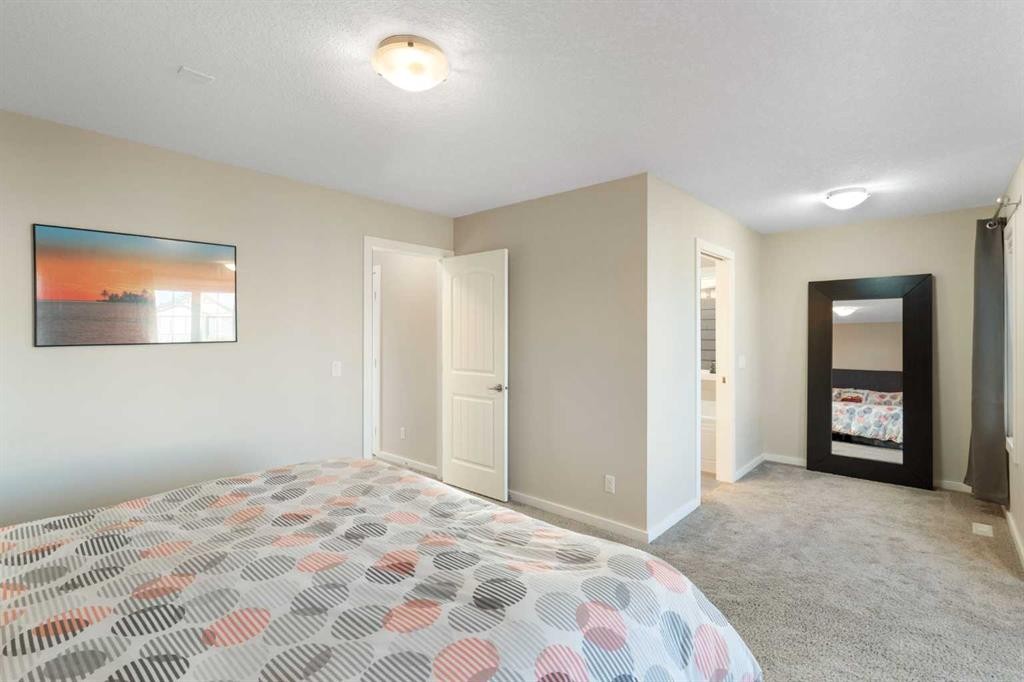 13 Marquis Place Se, Calgary, AB - Indoor Photo Showing Bedroom