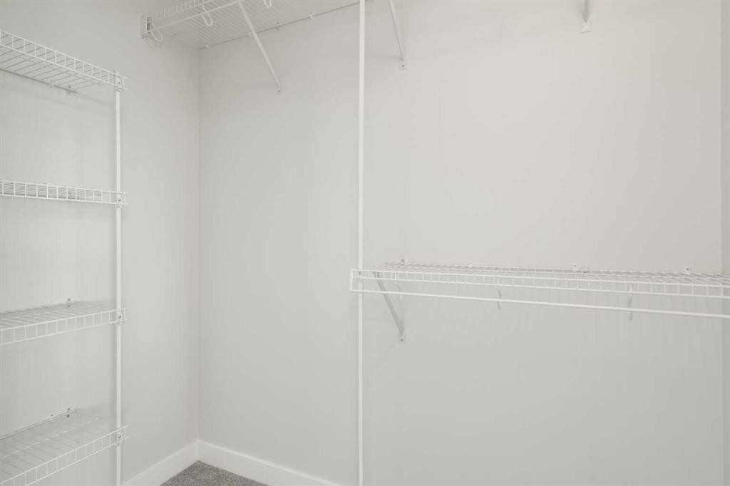 99 Edith Passage Nw, Calgary, AB - Indoor With Storage