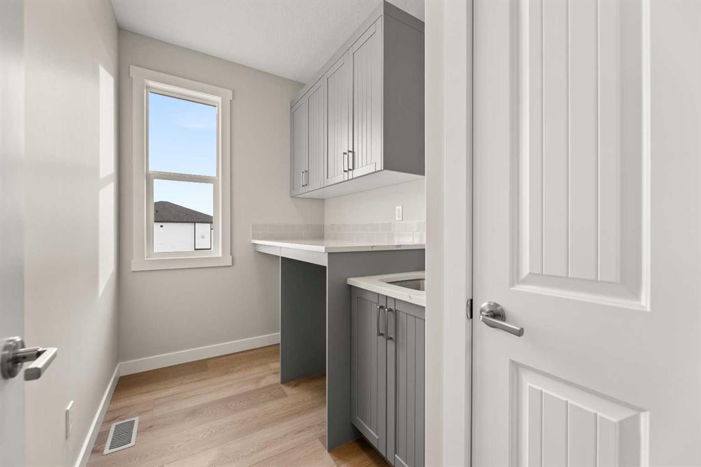 3434 Victory Way, Olds, AB - Indoor Photo Showing Laundry Room