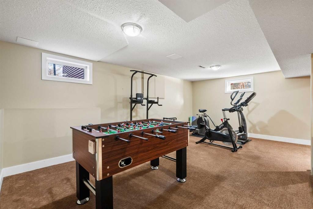 612 Willoughby Crescent Se, Calgary, AB - Indoor Photo Showing Gym Room