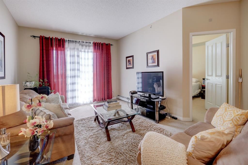 1413-1140 Taradale Drive Ne, Calgary, AB - Indoor Photo Showing Living Room