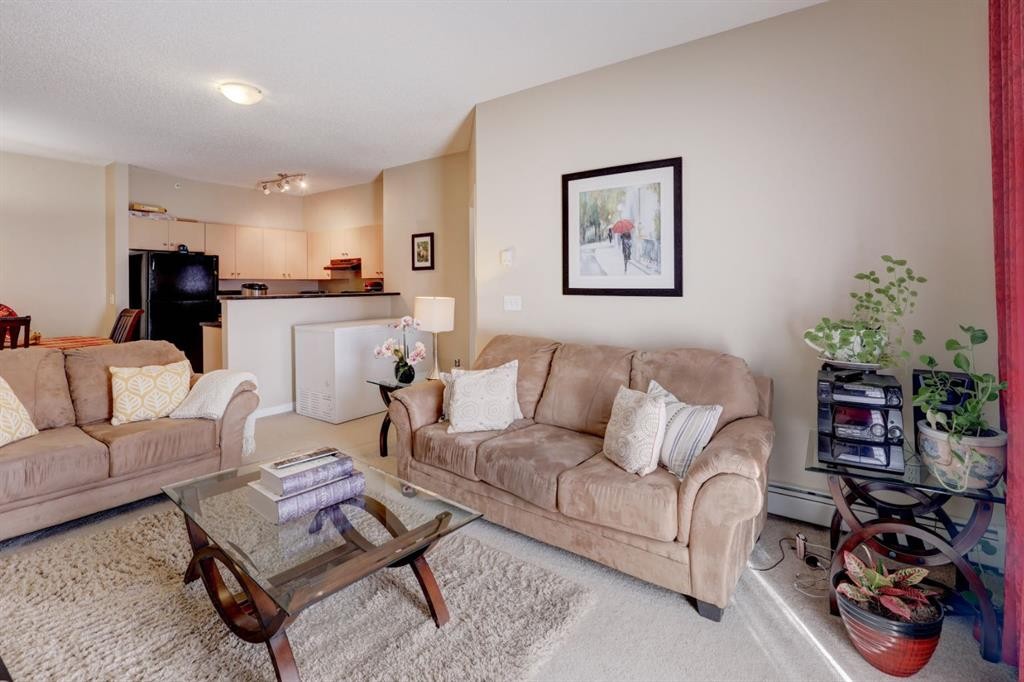 1413-1140 Taradale Drive Ne, Calgary, AB - Indoor Photo Showing Living Room