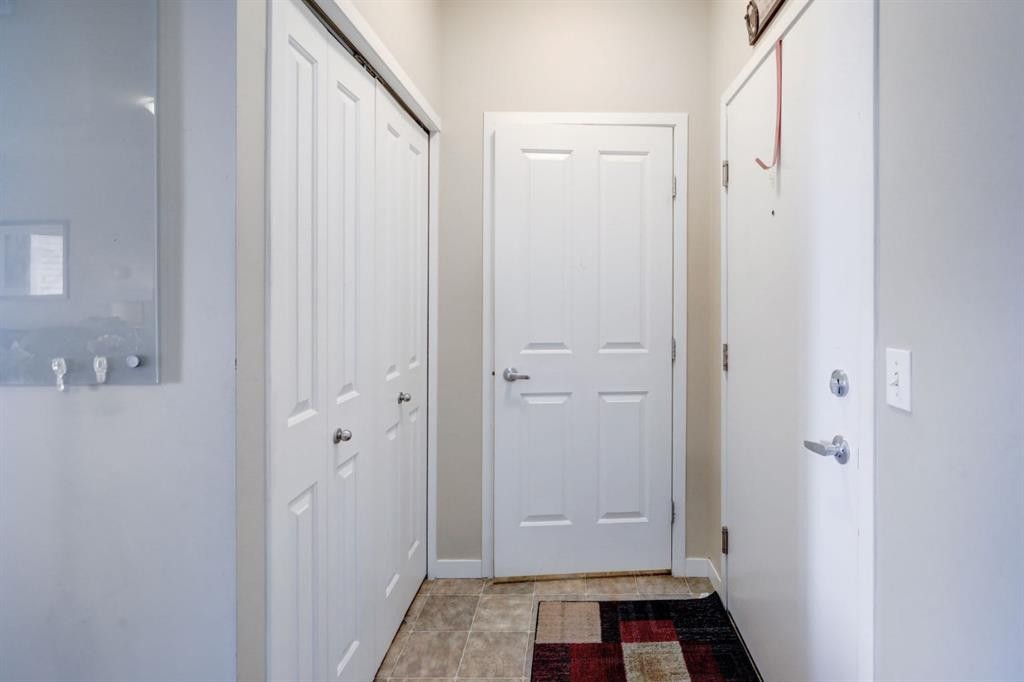 1413-1140 Taradale Drive Ne, Calgary, AB - Indoor Photo Showing Other Room