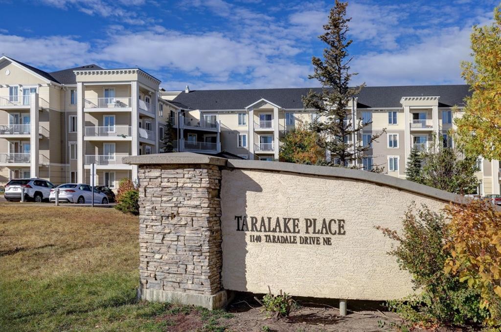 1413-1140 Taradale Drive Ne, Calgary, AB - Outdoor With Balcony With Facade