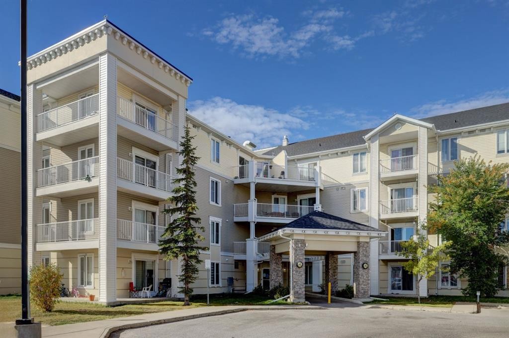 1413-1140 Taradale Drive Ne, Calgary, AB - Outdoor With Balcony With Facade