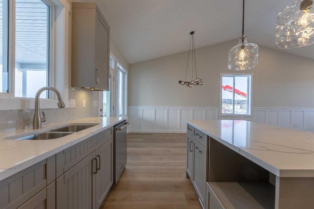 3438 Victory Way, Olds, AB - Indoor Photo Showing Kitchen With Double Sink