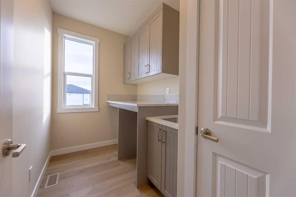 3438 Victory Way, Olds, AB - Indoor Photo Showing Laundry Room
