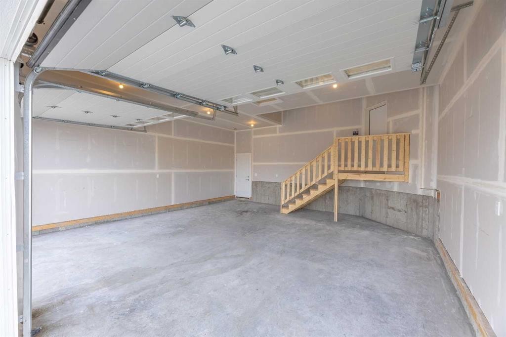 3438 Victory Way, Olds, AB - Indoor Photo Showing Garage