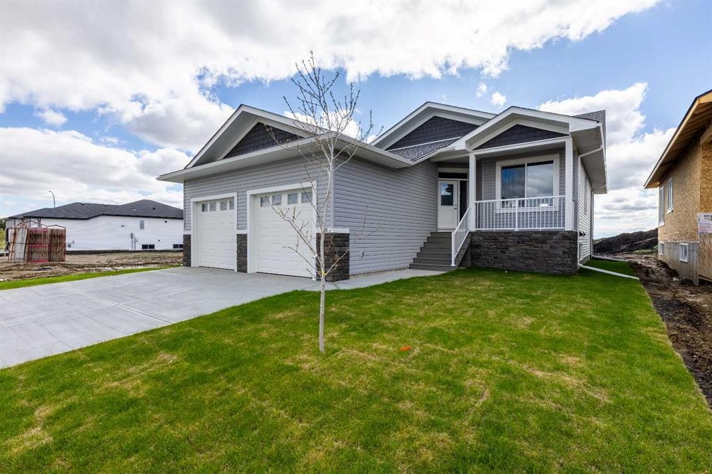 3438 Victory Way, Olds, AB - Outdoor With Facade