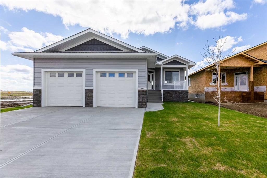 3438 Victory Way, Olds, AB - Outdoor With Facade