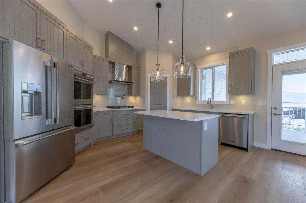 3438 Victory Way, Olds, AB - Indoor Photo Showing Kitchen With Upgraded Kitchen