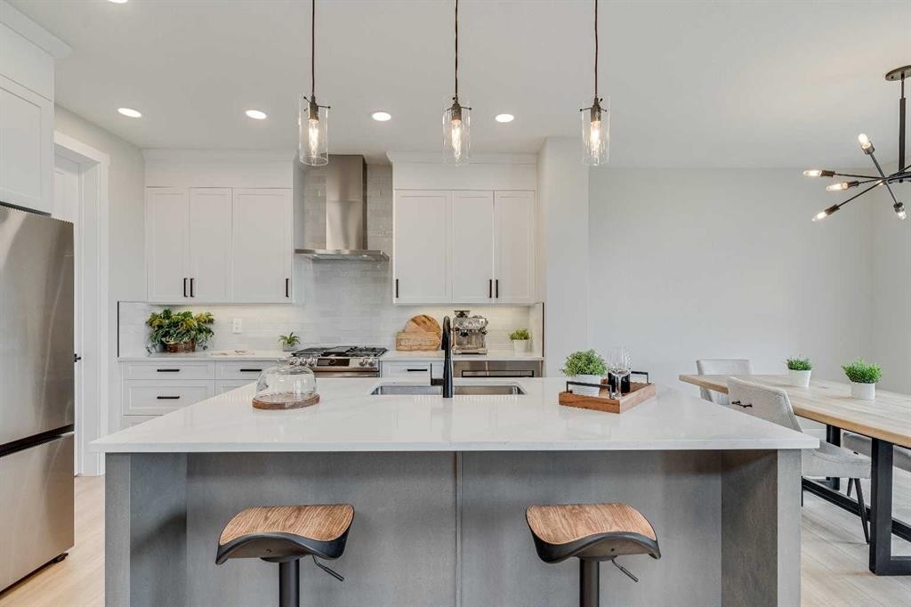 463 Kinniburgh Loop, Chestermere, AB - Indoor Photo Showing Kitchen With Upgraded Kitchen